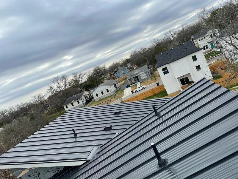 Standing seam metal roof panels with vents for Skylight Repair in Orem